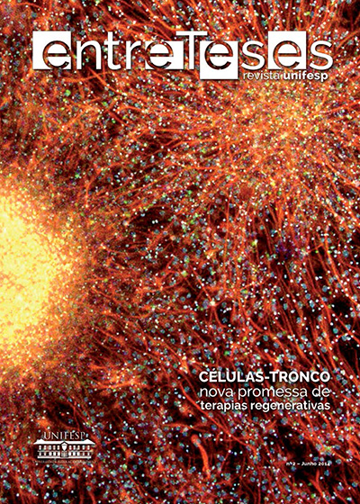 Capa da Entreteses, com uma imagem de microscopia da uma célula